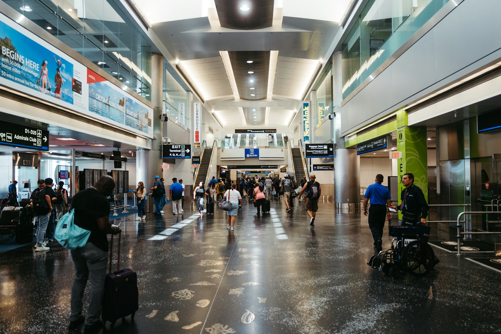 Business travellers walking through an airport terminal