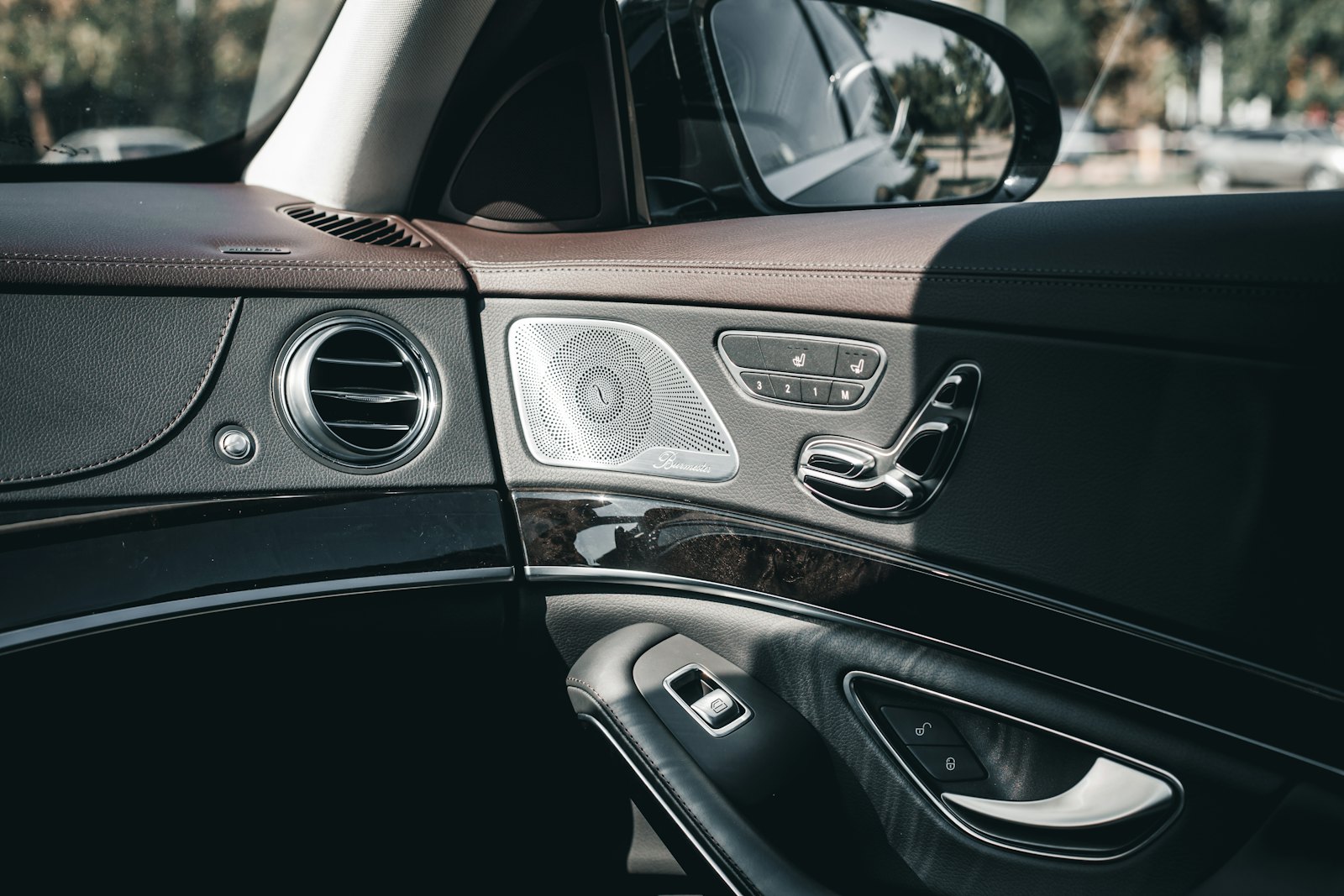 Interior of an executive Mercedes saloon showing the dashboard and controls